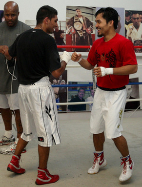 Amir Khan sharing a laugh with Manny Pacquiao