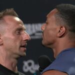 Larry Wheels and Vitaly face off at the final presser for Brand Risk 15