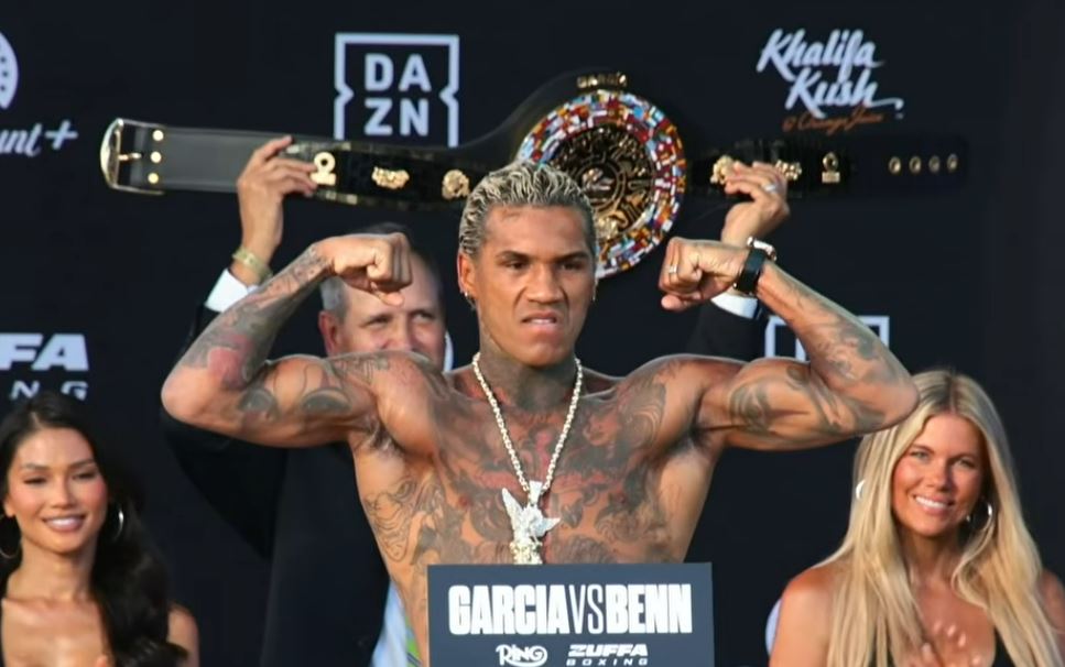 Conor Benn flexes his muscles at weigh in for his fight with Ryan Garcia