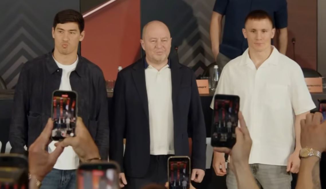 Dmitry Bivol and Michael Eifert side by side in Russia