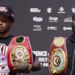 Errol Spence Jr and Terence Crawford side by side with belts