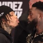 Boxers Tank Davis and Frank Martin look at each other face off