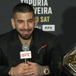 Ilia Topuria with UFC title