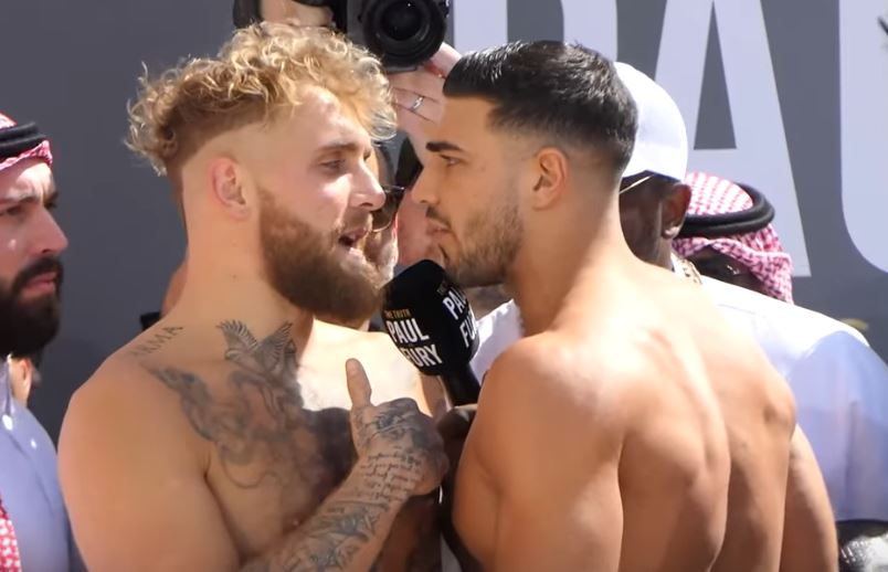 Jake Paul and Tommy Fury face off at weigh in for boxing match