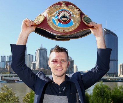 Jeff Horn smiles with belt