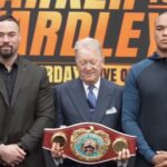 Boxers Joseph Parker and Fabio Wardley with championship belt at event