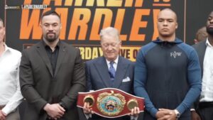 Boxers Joseph Parker and Fabio Wardley with championship belt at event