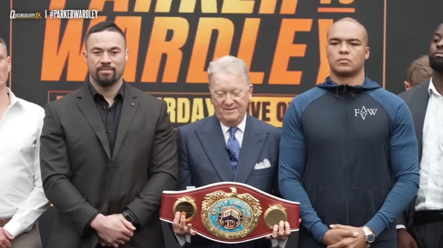 Boxers Joseph Parker and Fabio Wardley with championship belt at event