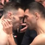 Jack Catterall grabs Josh Taylor by the neck