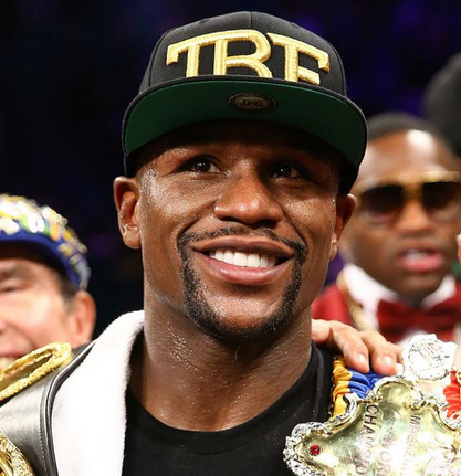 Floyd Mayweather Smiling with TBE hat on
