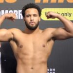 Moses Itauma flex at weigh in for his title fight with Filip Hrgovic