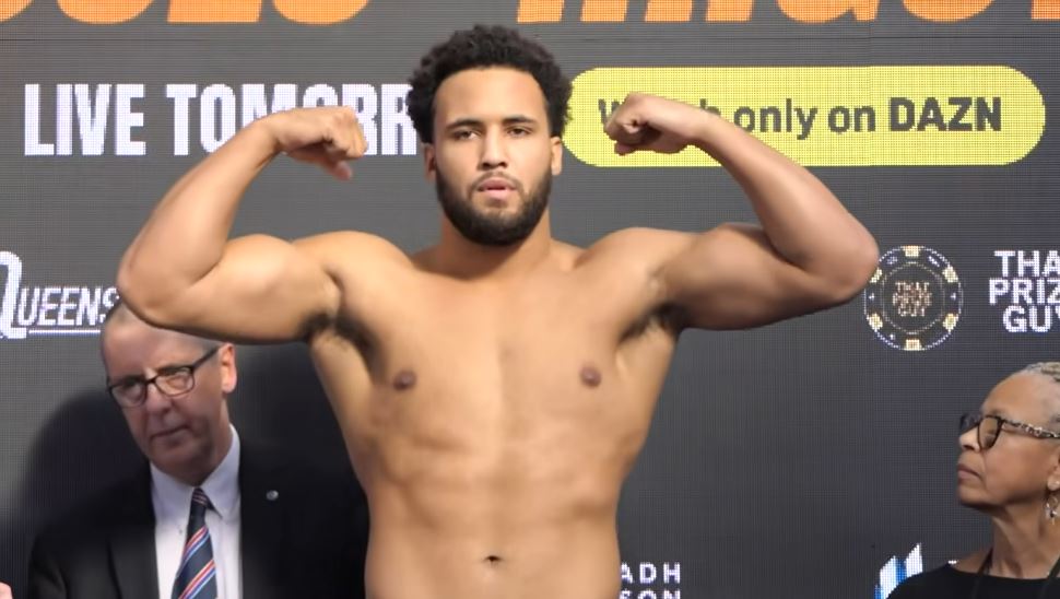 Moses Itauma flex at weigh in for his title fight with Filip Hrgovic