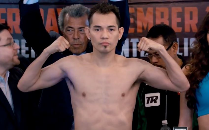 Nonito Donaire flexing muscles