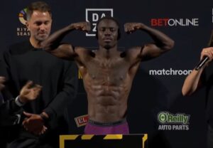 Champion Richardson Hitchins weigh in flexing