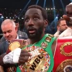 Terence Crawford with championship belts