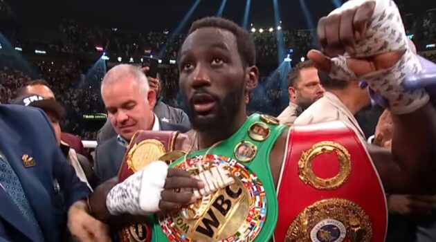 Terence Crawford with championship belts