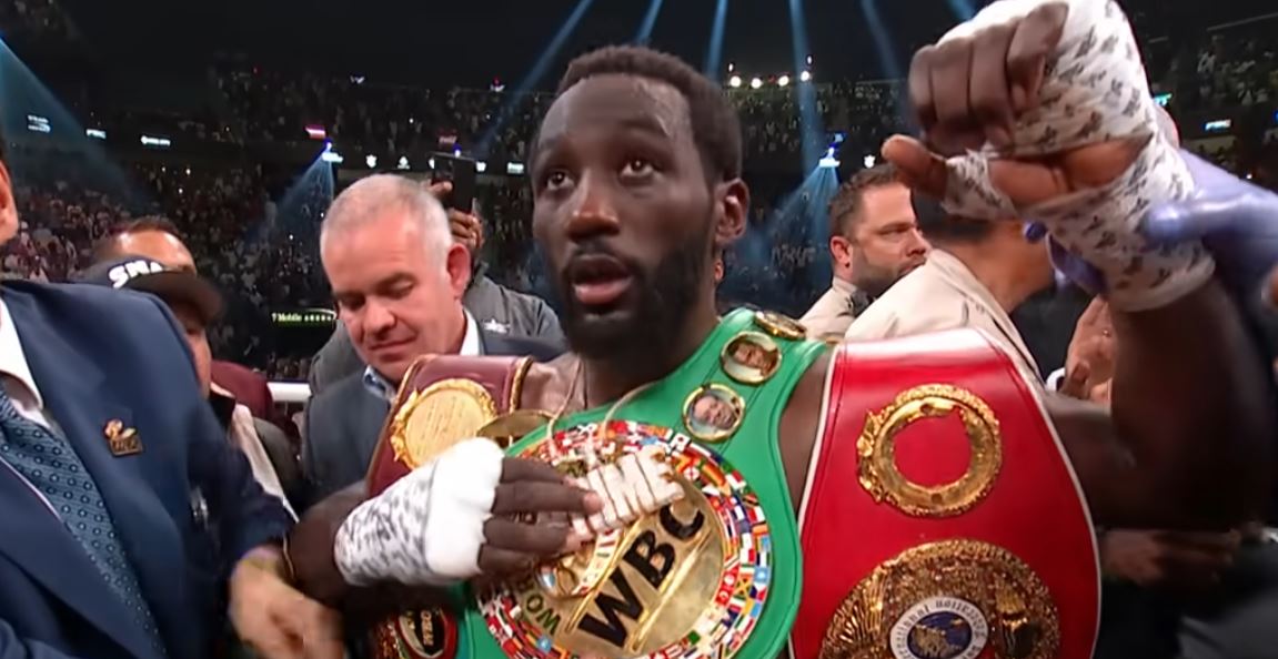 Terence Crawford with championship belts