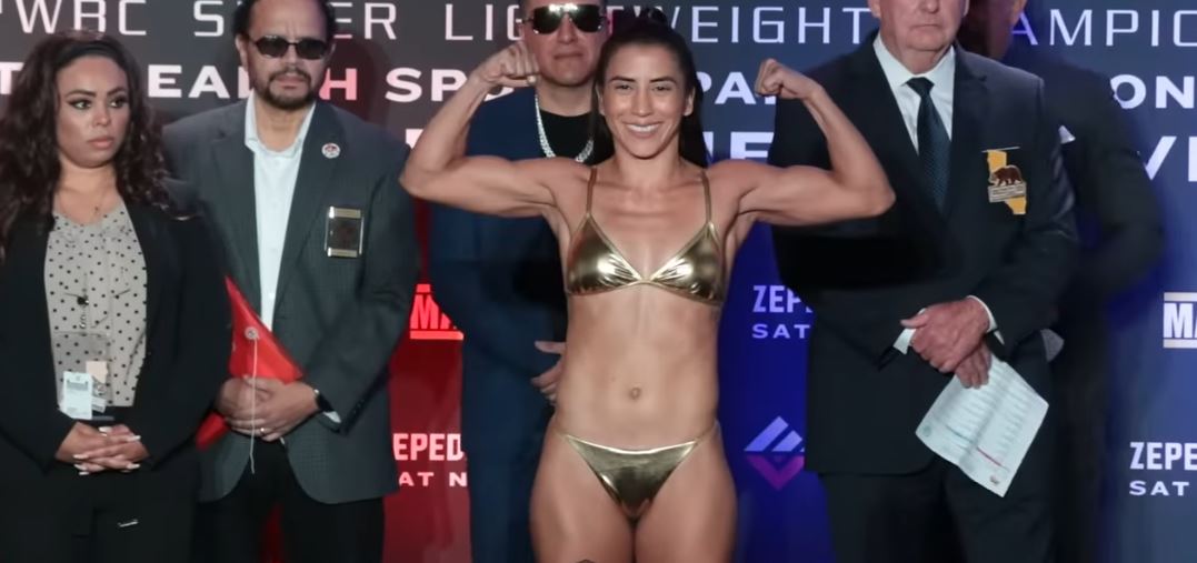 Pretty female boxing champion Yokasta Valle in bikini