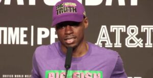 Errol Spence Jr purple outfit Ugas presser