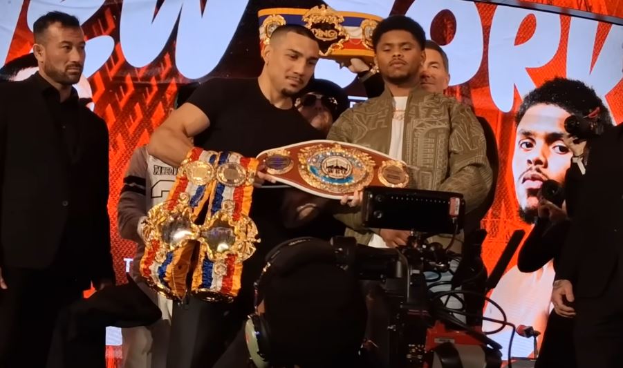 Teofimo Lopez and Shakur Stevenson holding belts